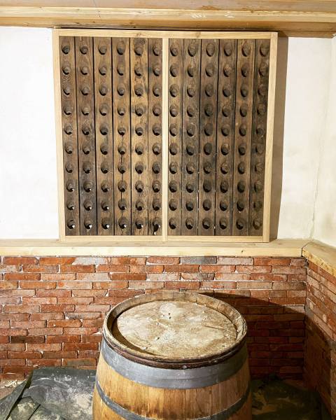 Meuble de rangement de bouteille style vintage en bois ancien pour cave à vin par Ben & Bois à Villefranche sur Saône.